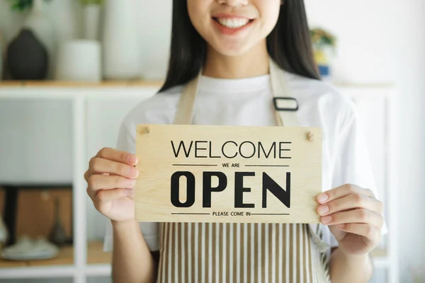 Open Business Owner Woman Wearing Protection Turning Open Sign Board - Stock-foto