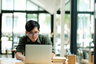 Stressed overwork businessman in the office.