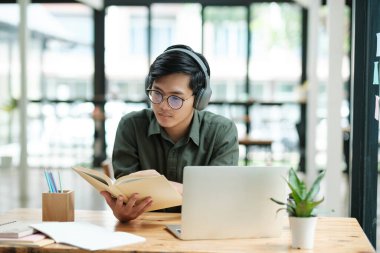 Stressed overwork businessman in the office.