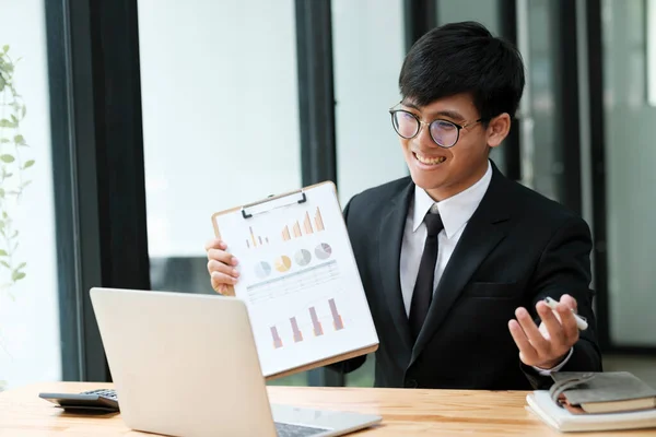 Businessman Holding Graph Statistic Paper Having Video Meeting Client Using — Stock Photo, Image