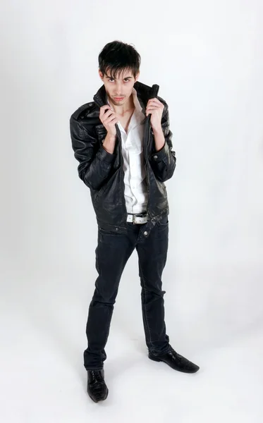 Attractive young man in black leather jacket — Stock Photo, Image