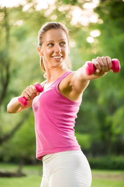 Exercising with weights — Stock Photo, Image