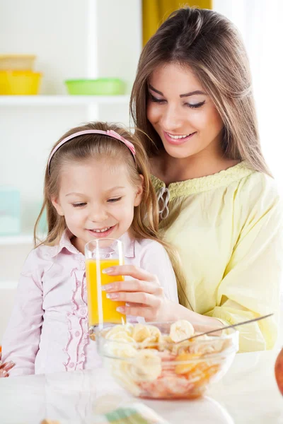 Mother and daughter in the kitchen Royalty Free Stock Images