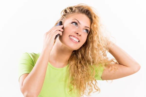 Excited girl talking on the phone — Stock Photo, Image