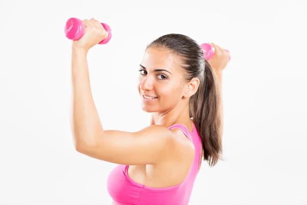 Fitness donna sollevamento manubri — Foto Stock