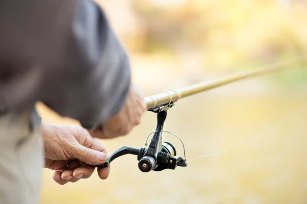 Fiskespö och -rulle — Stockfoto