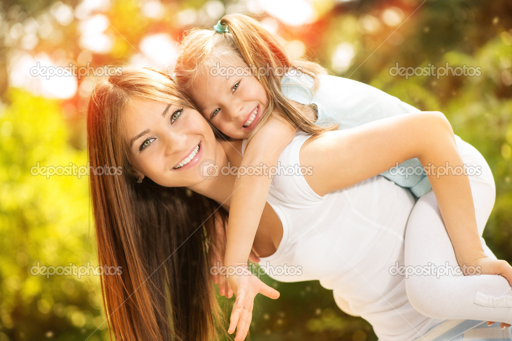 Mother and daughter in the nature