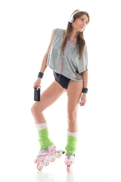 Young woman in roller skates — Stock Photo, Image