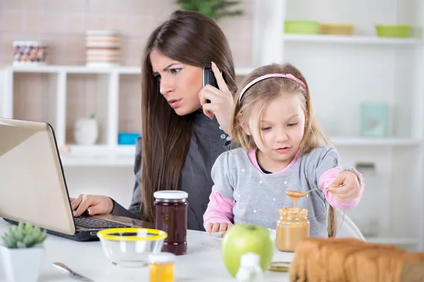 Overworked businesswoman at home — Stock Photo, Image