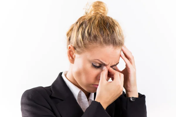 Businesswoman with a headache — Stock Photo, Image