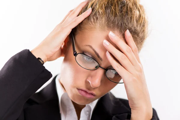 Zakenvrouw met een hoofdpijn — Stockfoto