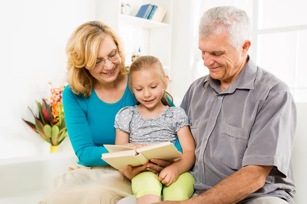 Grandparents with little girl — Stock Photo, Image