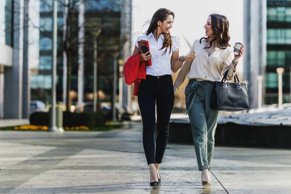 Two Attractive Smiling Businesswoman Chatting While Walking Way Work — Stock Photo, Image