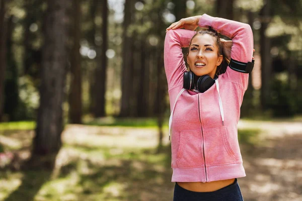 Young Beautiful Smiling Female Runner Stretching Jogging Nature — 스톡 사진