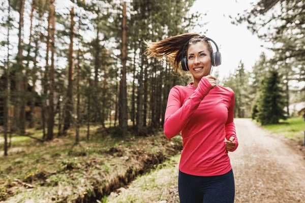 Young Beautiful Smiling Woman Listening Music Jogging Nature — 스톡 사진