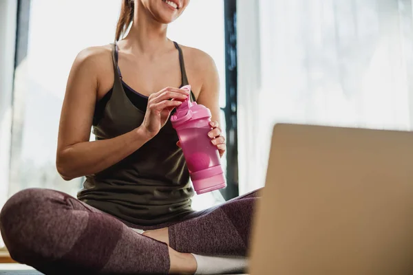Cropped Shot Young Woman Using Laptop While Doing Stretching Exercises — Stock Fotó