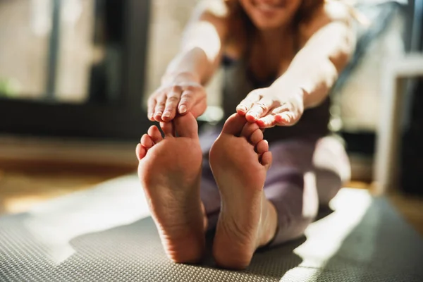 Cropped Shot Relaxed Young Woman Doing Stretching Yoga Exercises Home — Foto Stock