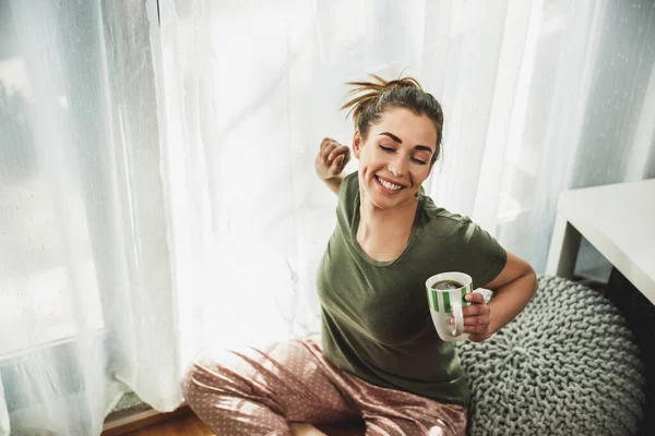 Young Smiling Woman Enjoying Coffee Cozy Morning Sunshine Window Home — 스톡 사진