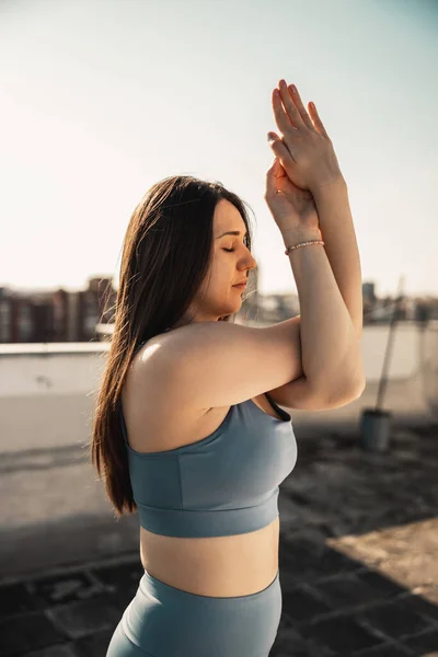 Relaxed Young Woman Practicing Yoga Rooftop Terrace Sunset — стоковое фото