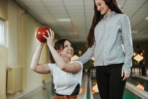 Two Young Girls Having Fun While Bowling Speding Time Together — Foto de Stock