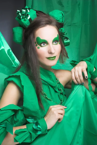 Woman in green. — Stock Photo, Image