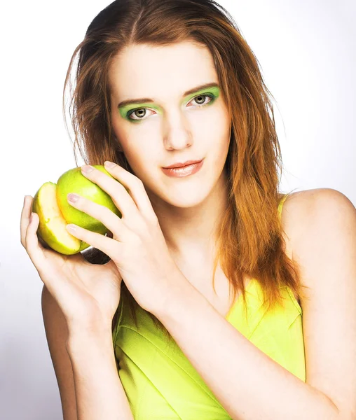 Young woman with green apple — Stock Photo, Image