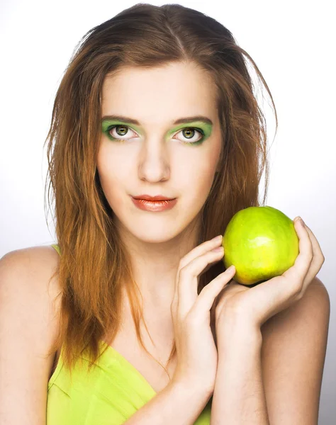 Young woman with green apple — Stock Photo, Image