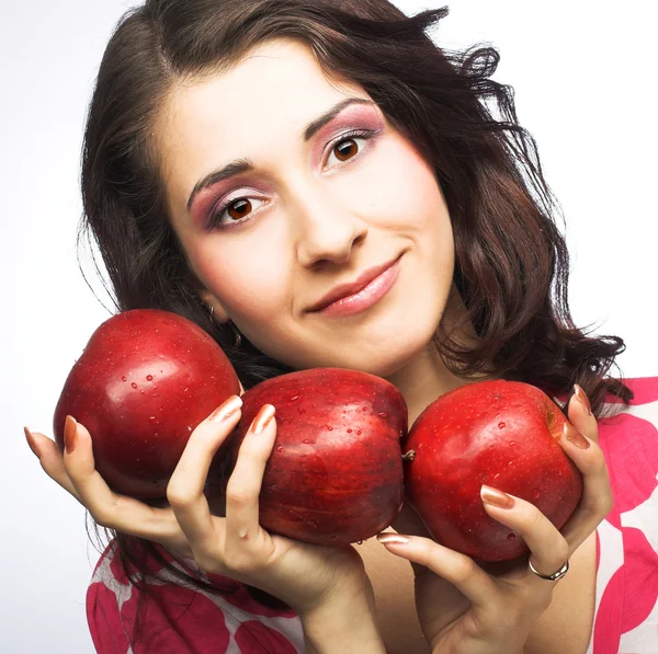 Девушка с яблоками — стоковое фото