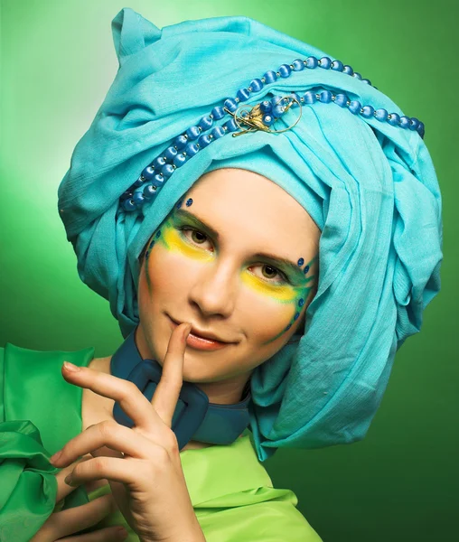 Young woman in blue turban — Stock Photo, Image