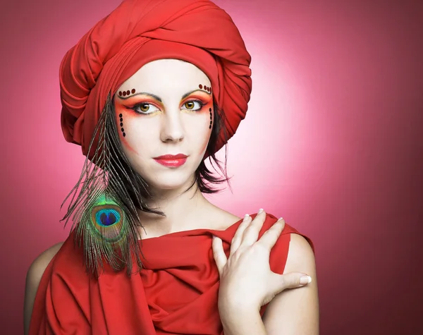 Woman in red turban — Stock Photo, Image