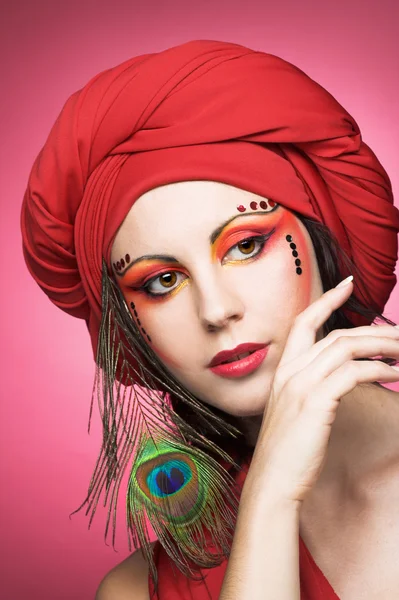 Woman in red turban — Stock Photo, Image