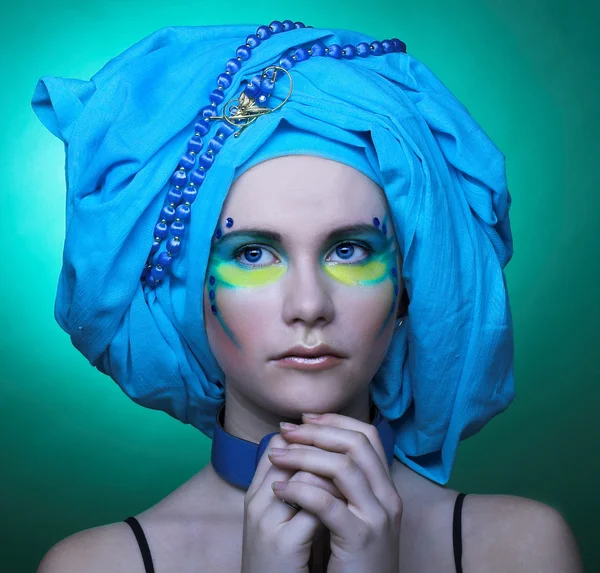 Young woman in blue turban — Stock Photo, Image