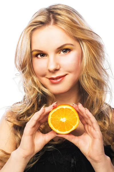 Mladá dívka s pomeranči — Stock fotografie