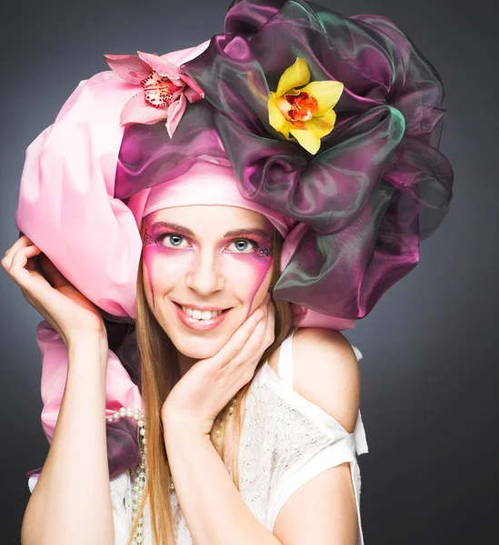 Young lady with orchids — Stock Photo, Image