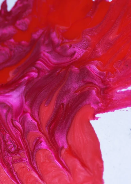 Roze en rood nagellak druppels — Stockfoto