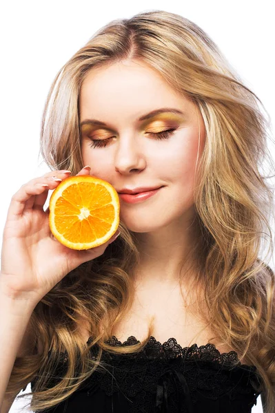 Young girl with orange — Stock Photo, Image