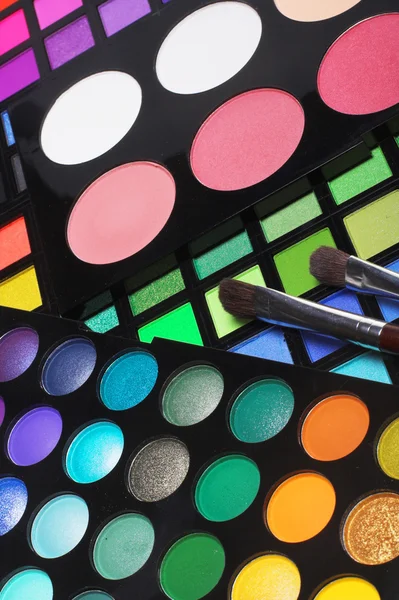 Professional cosmetics. Palettes of eye-shadow, rouge, powder. — Stock Photo, Image