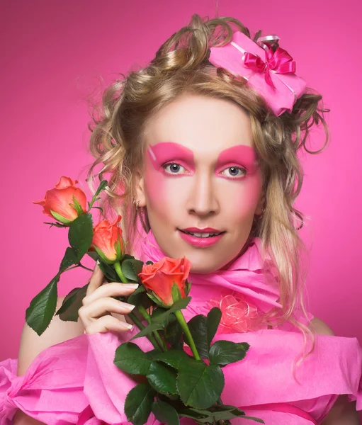 Mulher de rosa . — Fotografia de Stock