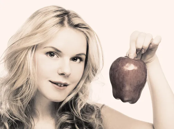 Mädchen mit rotem Apfel — Stockfoto