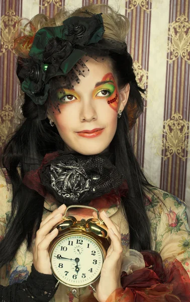 Fille avec horloge . — Photo