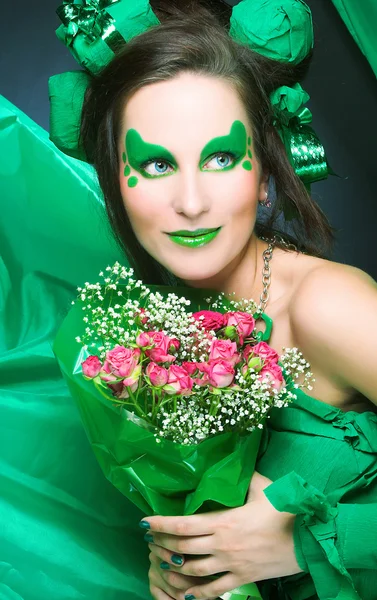 Woman in green. Stock Image