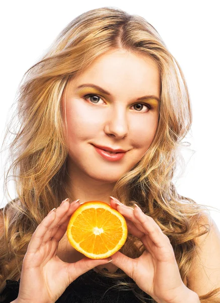 Young girl with orange — Stock Photo, Image