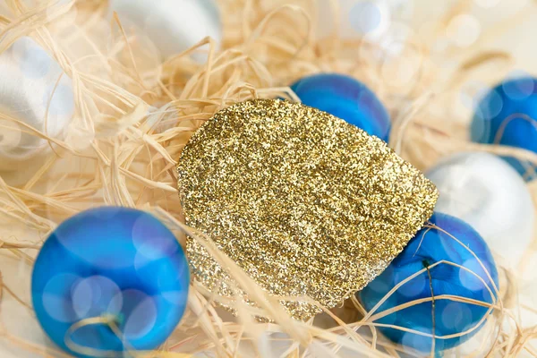 Christmas card with balls and gold leaf — Stock Photo, Image