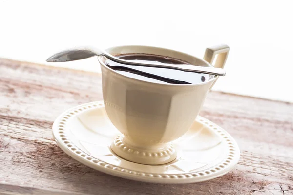 Kaffeetasse schwarze Holzplatte braun — Stockfoto