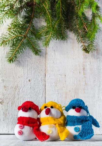 Snowmen board wooden Christmas winter plush trio — Stock Photo, Image