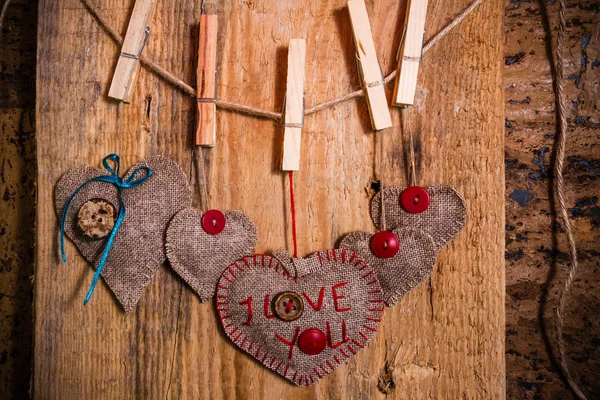 Valentine background hand-sewn heart wood wooden — Stock Photo, Image