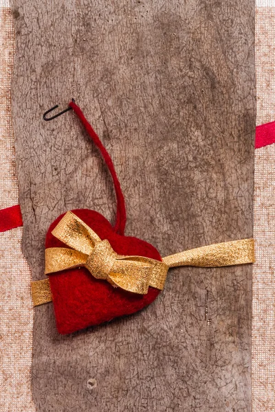 Valentijn achtergrond hand genaaid hart texstile — Stockfoto