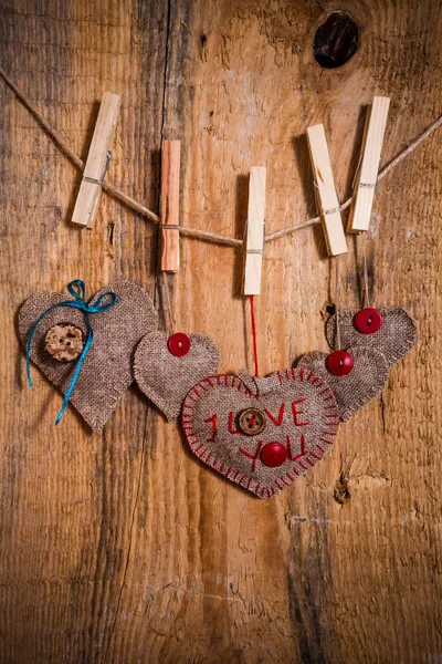 Valentine background hand-sewn heart wood wooden — Stock Photo, Image