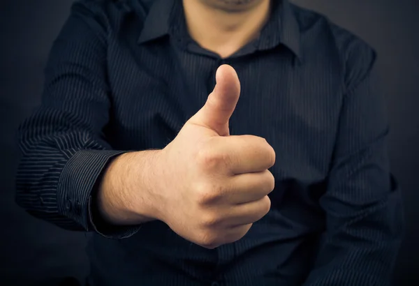 Closeup man hand showing thumbs — Stock Photo, Image