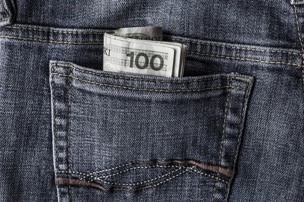 Several Polish banknotes jeans pocket — Stock Photo, Image